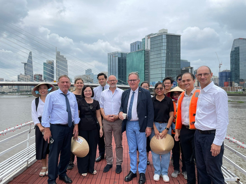 Figure 1. Group photo with the French Senate delegation and the Consul General of France on the Saigon River.