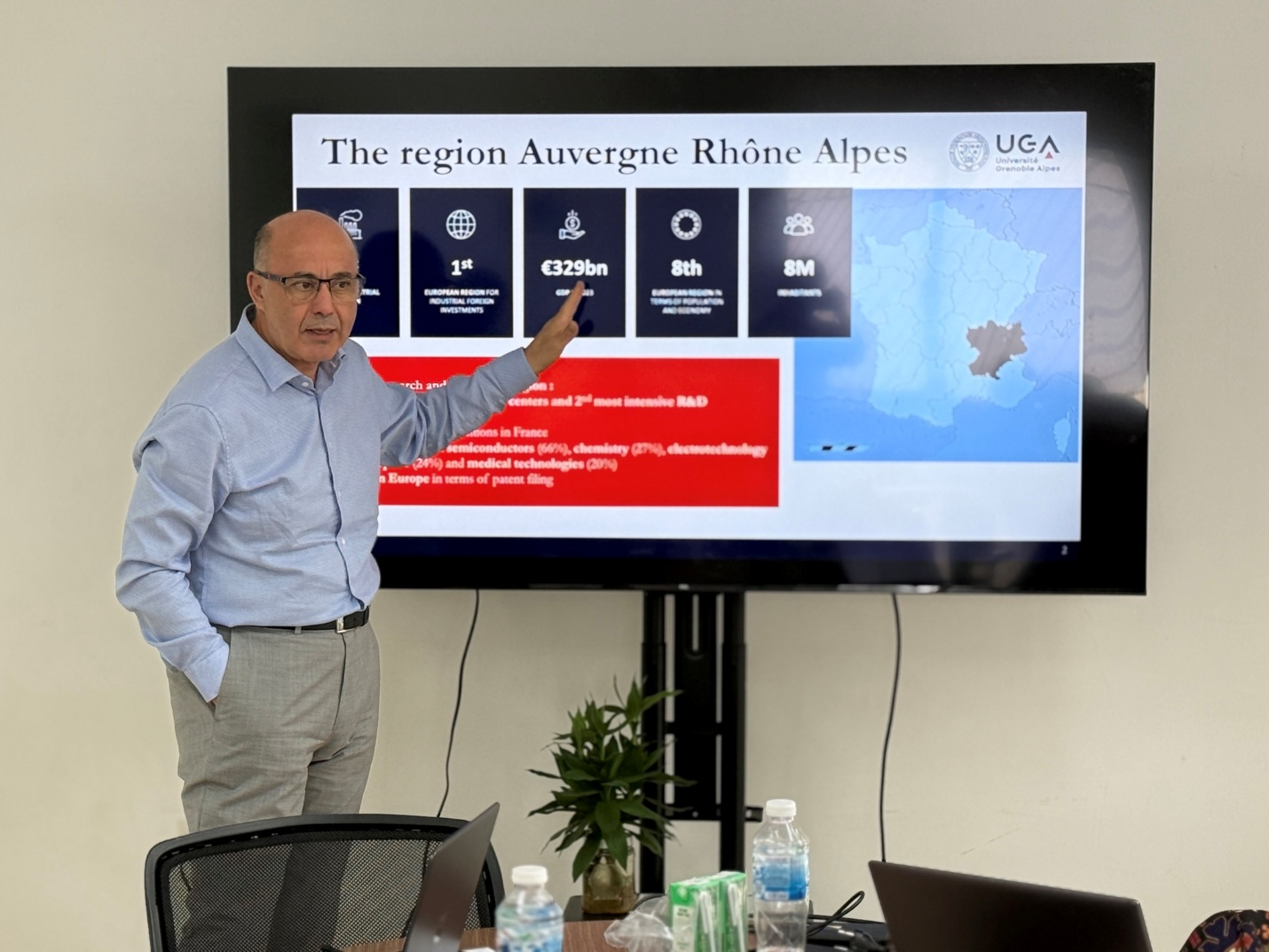 Prof. Yassine Lakhnech (President of UGA) presenting an overview of UGA